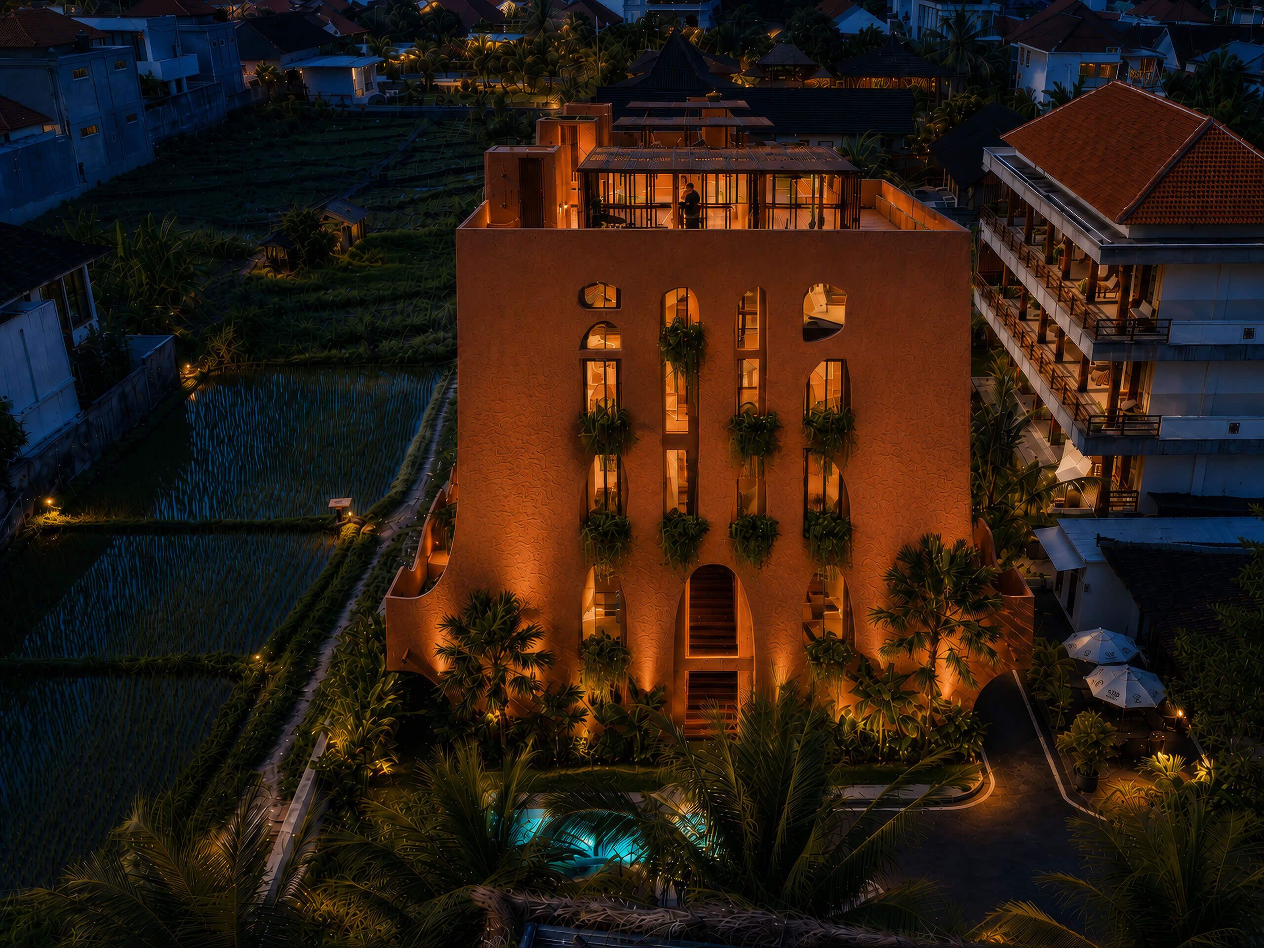 Ananta Villas Canggu lit up at night